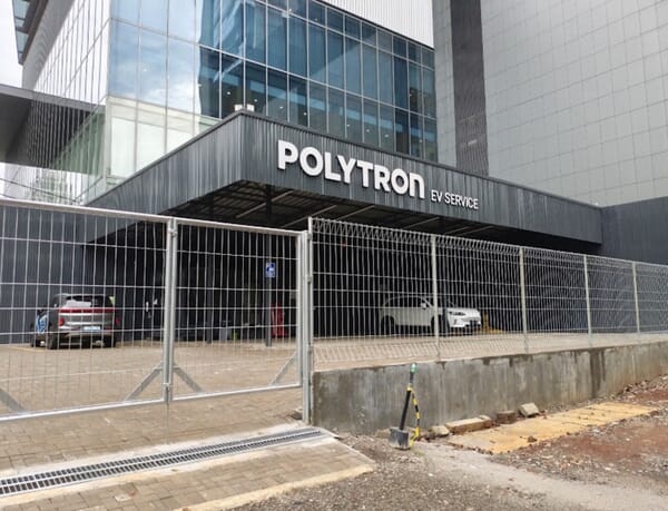 Polytron EV Sudirman — Showroom area bisnis premium